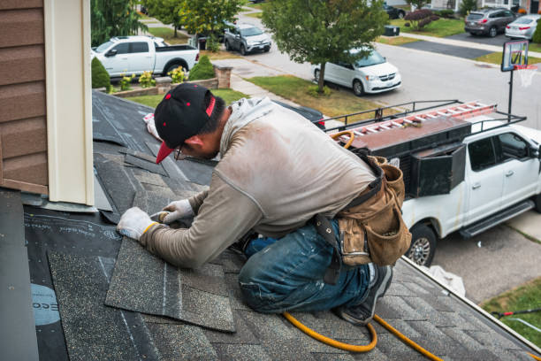 Professional Roofing technician working in Wilsons, VA